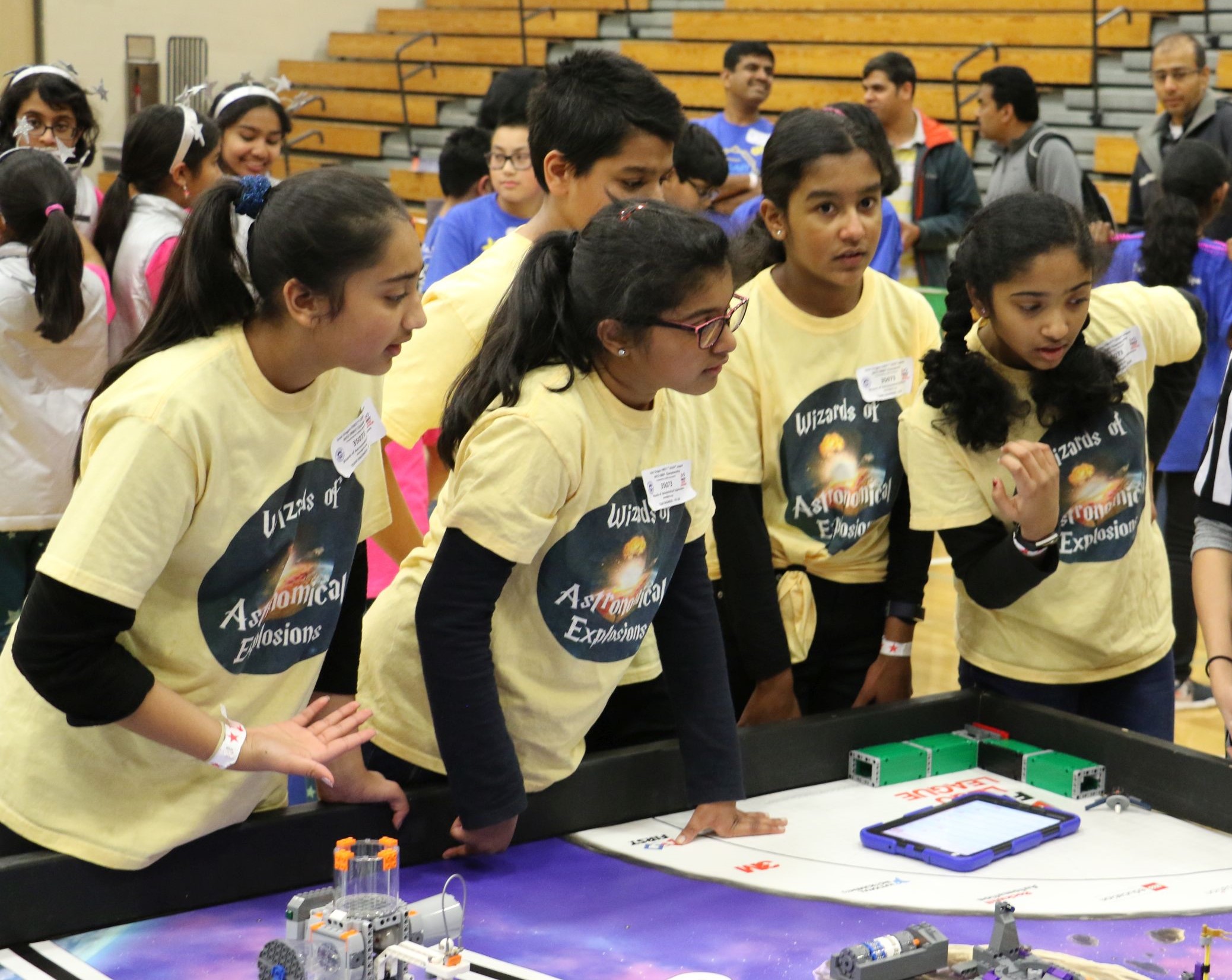Students at FIRST LEGO League table